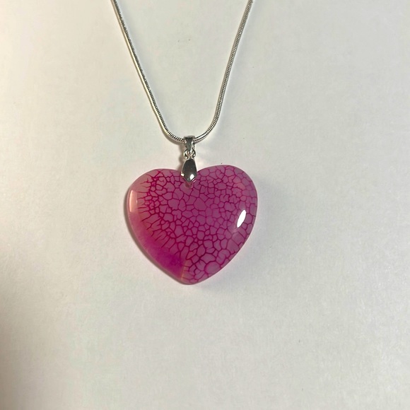 Jewelry - A pretty pink heart pendant with silver necklace